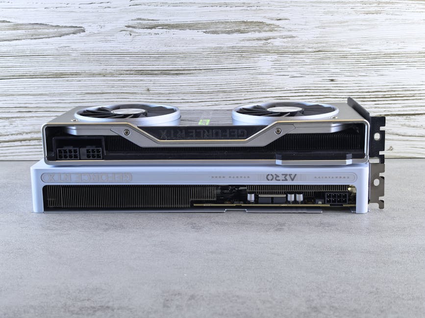 Two modern graphics cards stacked on a wooden surface, showcasing sleek design and advanced technology. – graphics card upgrade state